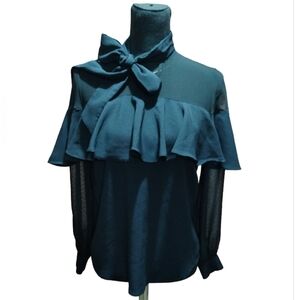 New York & Company Long-sleeved, black ruffle blouse with a bow tie neck.